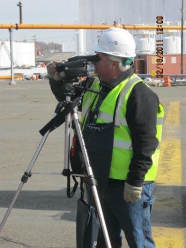 Dave Sawyer operating infrared gas imaging camera at industrial facility